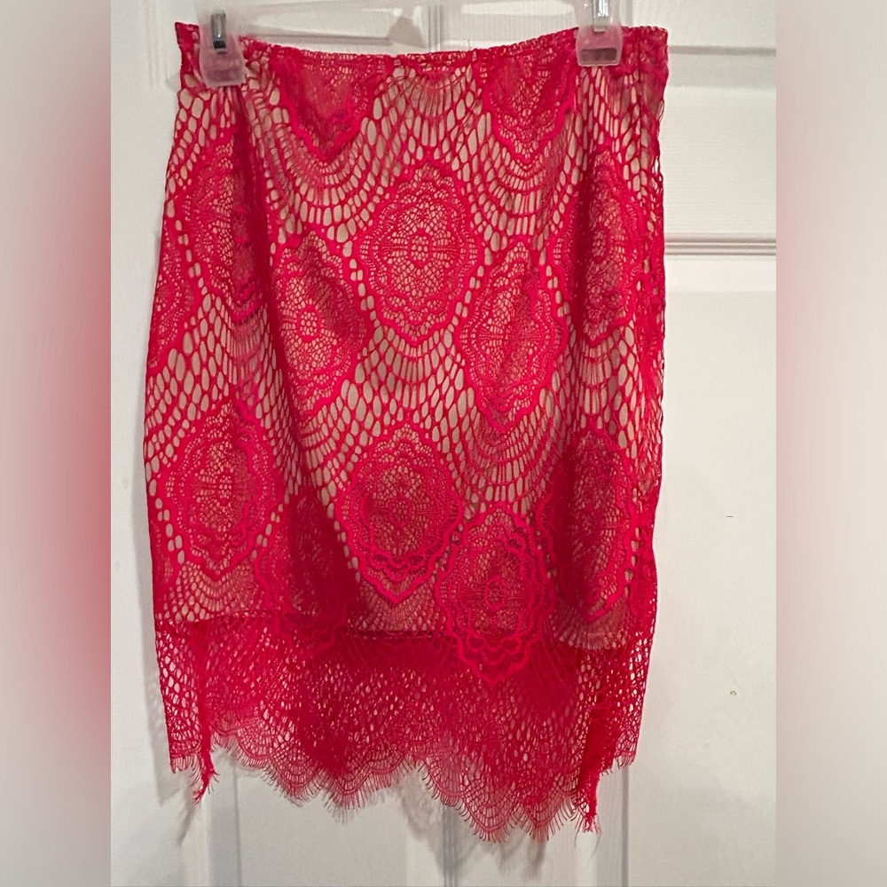 Red lace/crochet skirt with nude slip. Excellent condition. Size large.